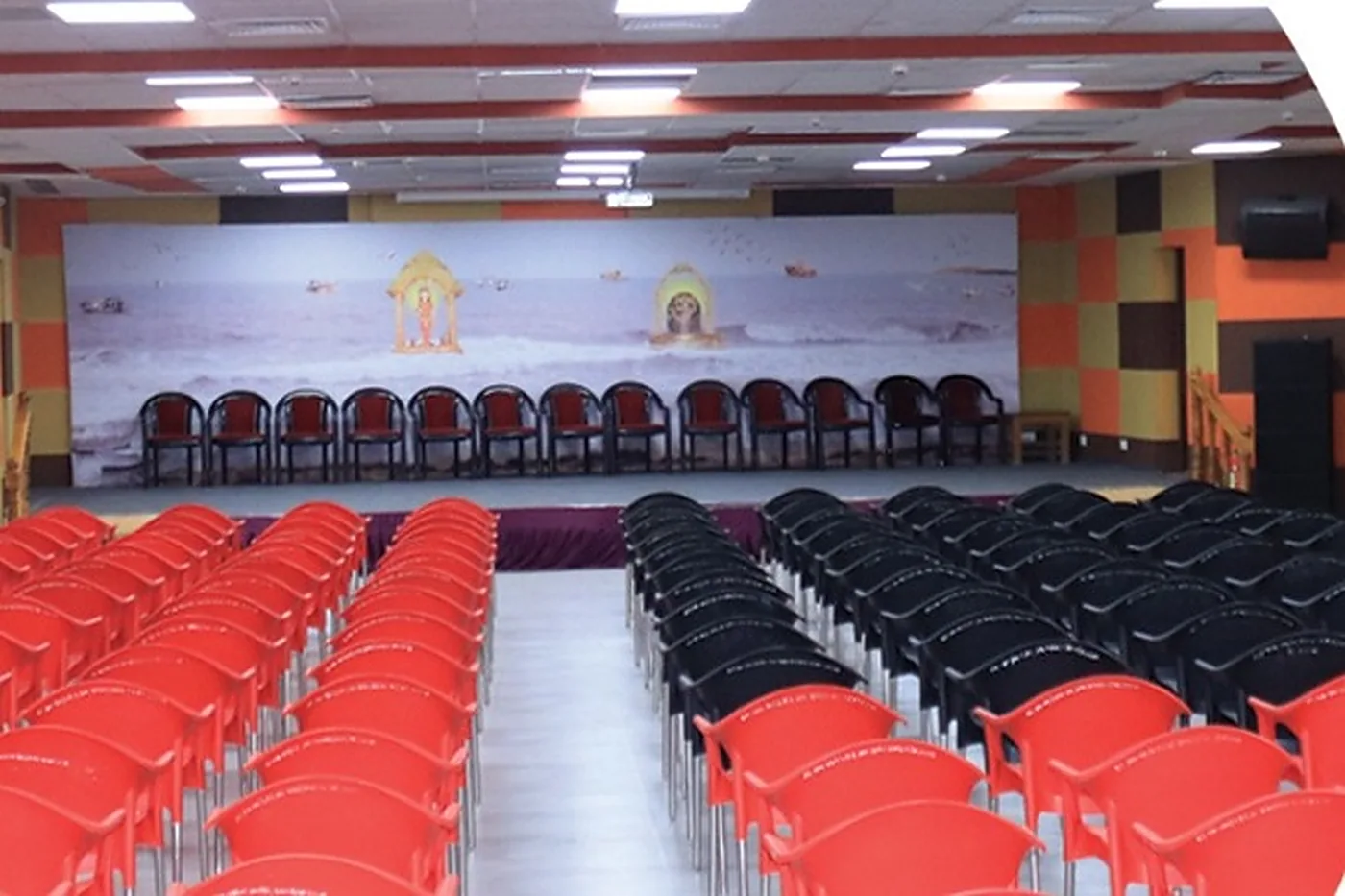 The Sagar Darshan samaroh (banquet) hall seen from the back, with seating facing the stage